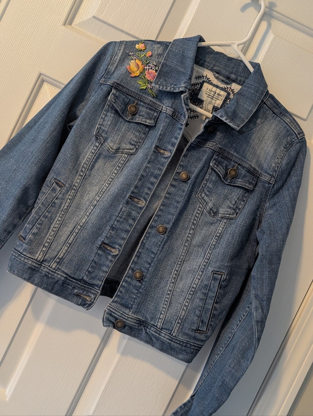 Levi's Blue Denim acket with Floral Accent.